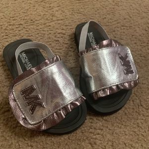 Michale kors slides size 9 toddler .
